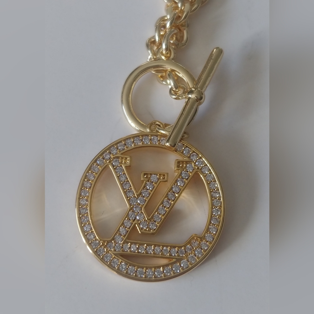 Louis Vuitton Gold and Crystal Pendant Necklace - Picture 1 of 12